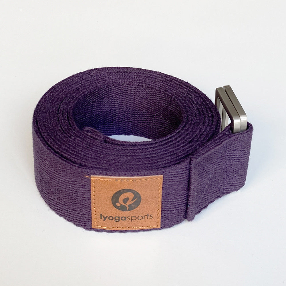 Purple yoga strap with a brown leather patch displaying 'lyogasports' on a white background