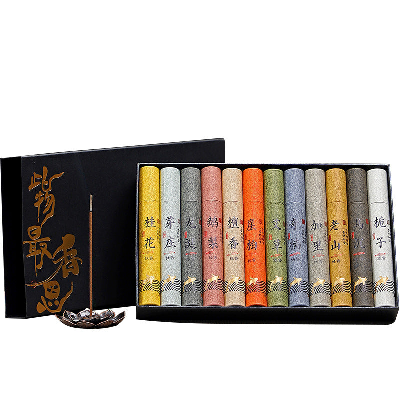 Set of incense sticks in a black box with gold text on a white background