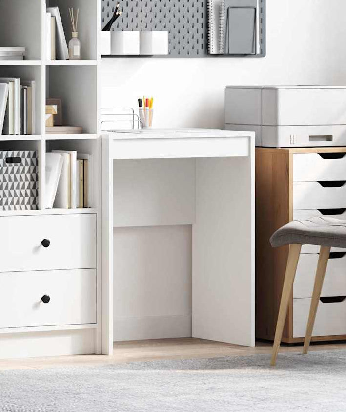 Modern home office with white desk, bookshelf, and chair.