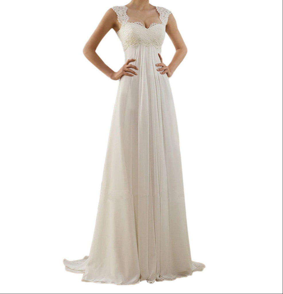 Beige evening gown with lace top on a white background