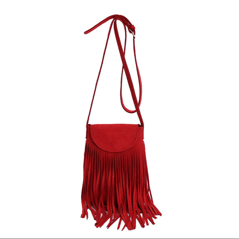 Red fringed handbag on a white background