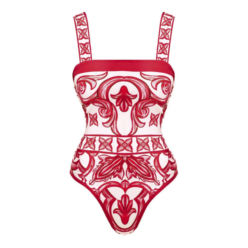 Red and white patterned swimsuit on a white background
