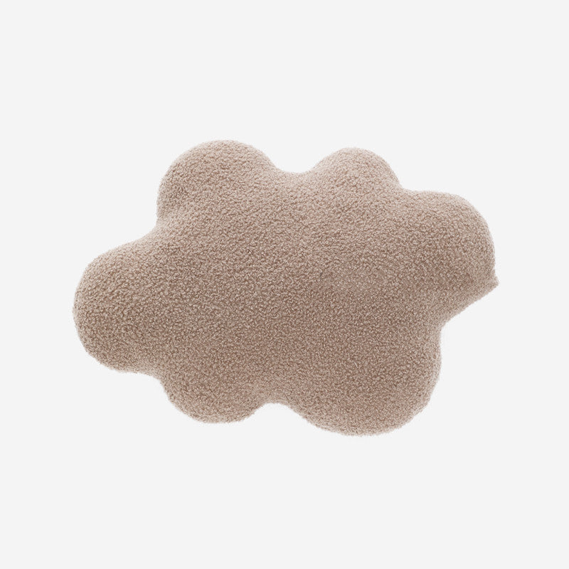 Beige cloud-shaped pillow on a white background