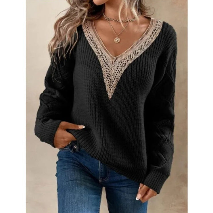 Black sweater with lace neckline worn by a person on a beige background