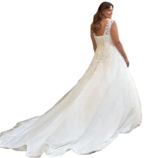 White wedding dress with lace details on a white background
