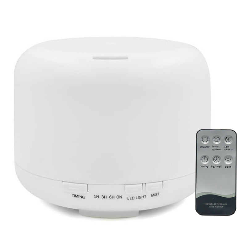 White diffuser with remote control on a white background