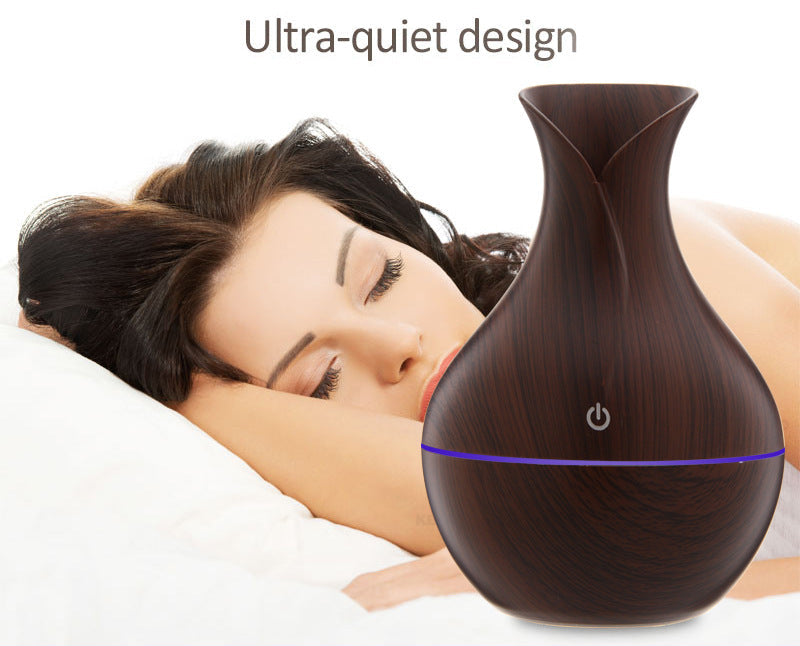 Woman sleeping with an ultra-quiet design diffuser in the foreground