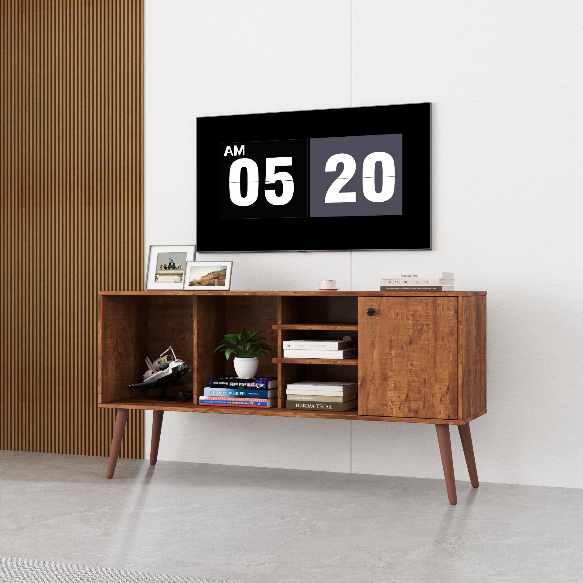 Wooden entertainment console with digital clock display in a room.