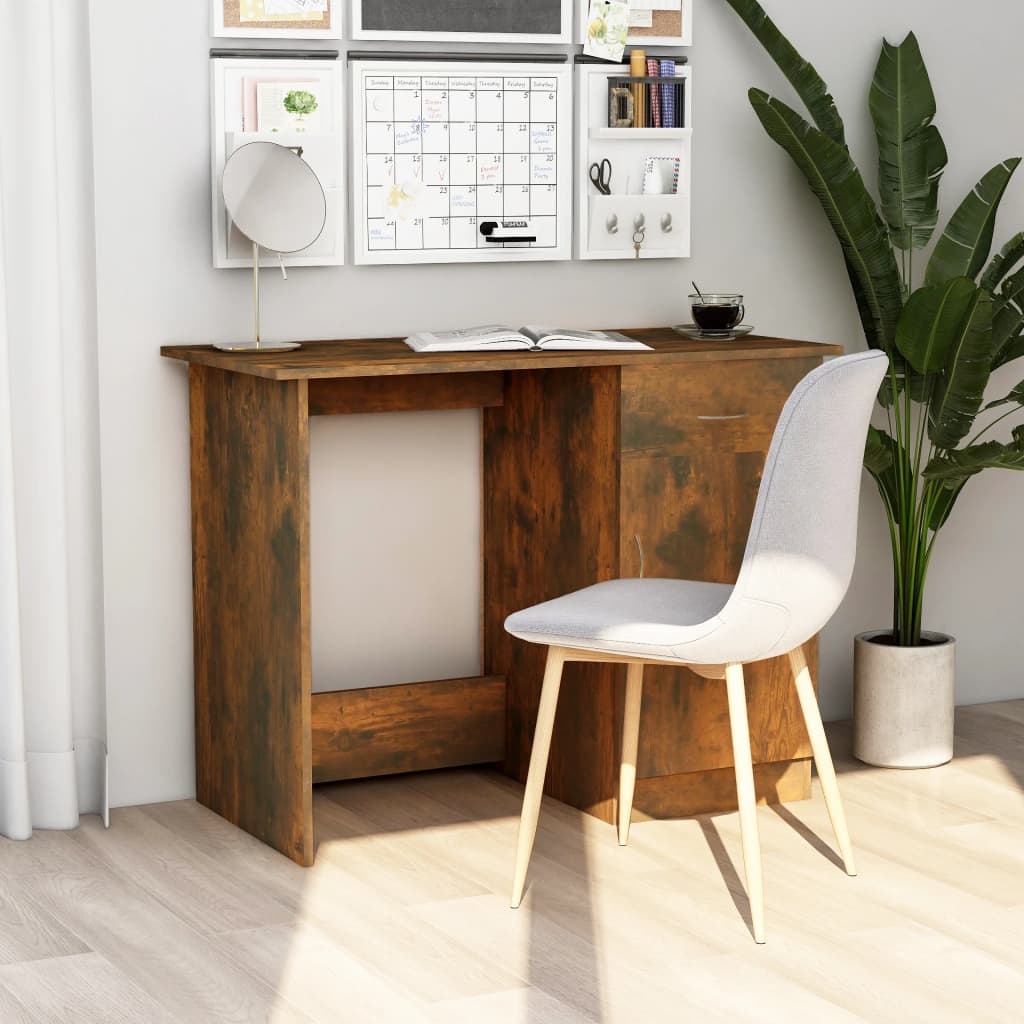 Wooden desk with a white chair in a room with a plant and shelves.