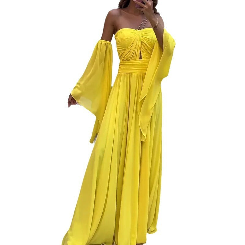 Yellow off-shoulder dress with flowing sleeves on a white background
