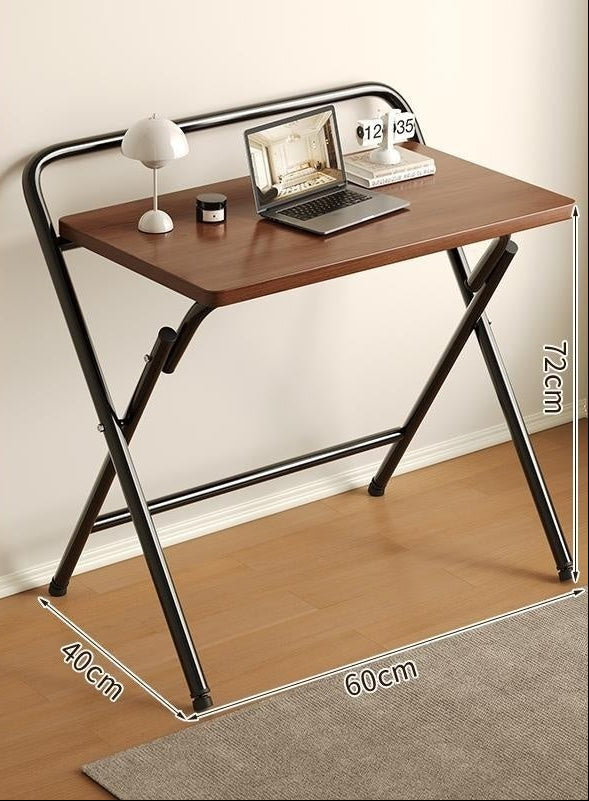 Folding desk with deep walnut top and black frame, shown with dimensions and usage suggestions.