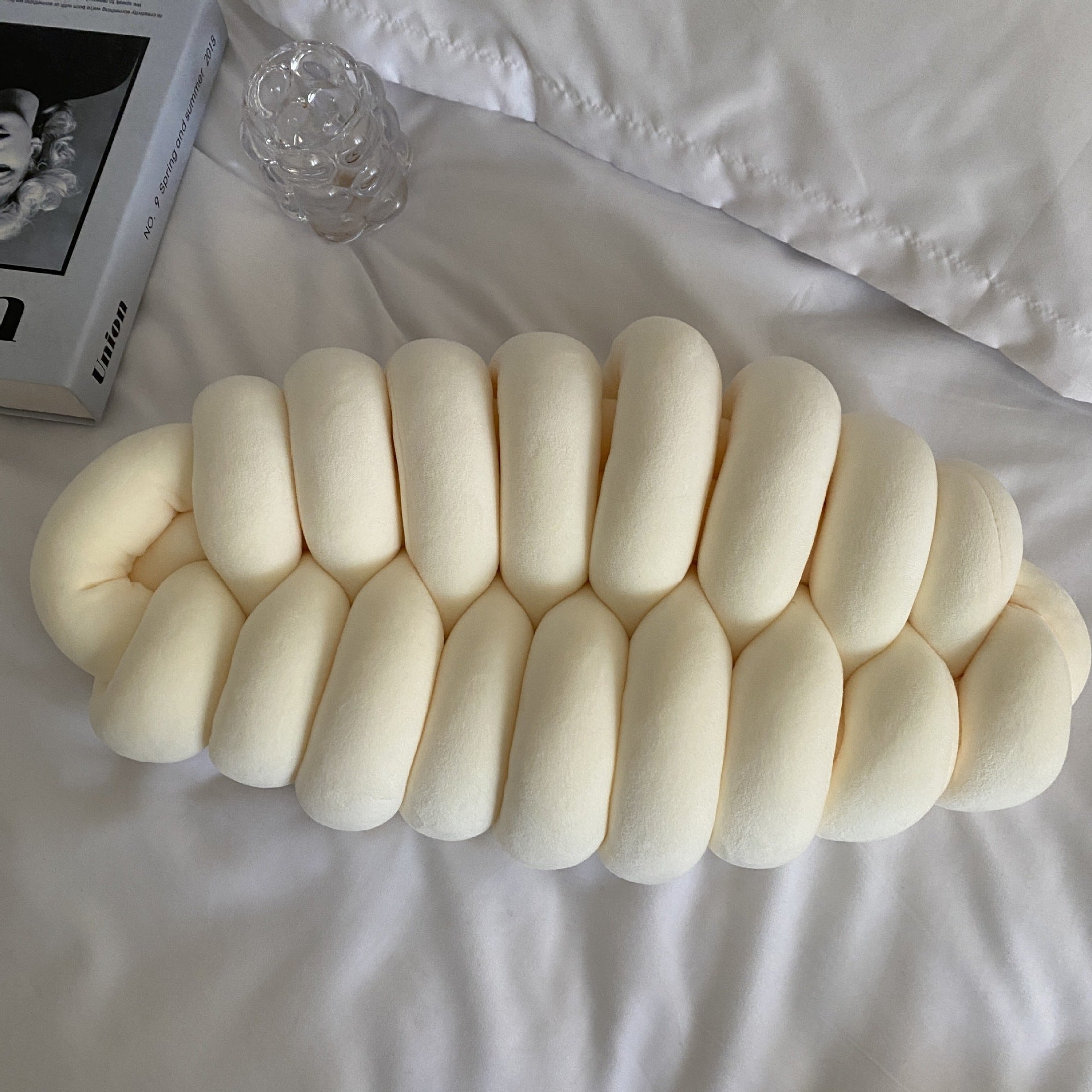 beige plush pillow