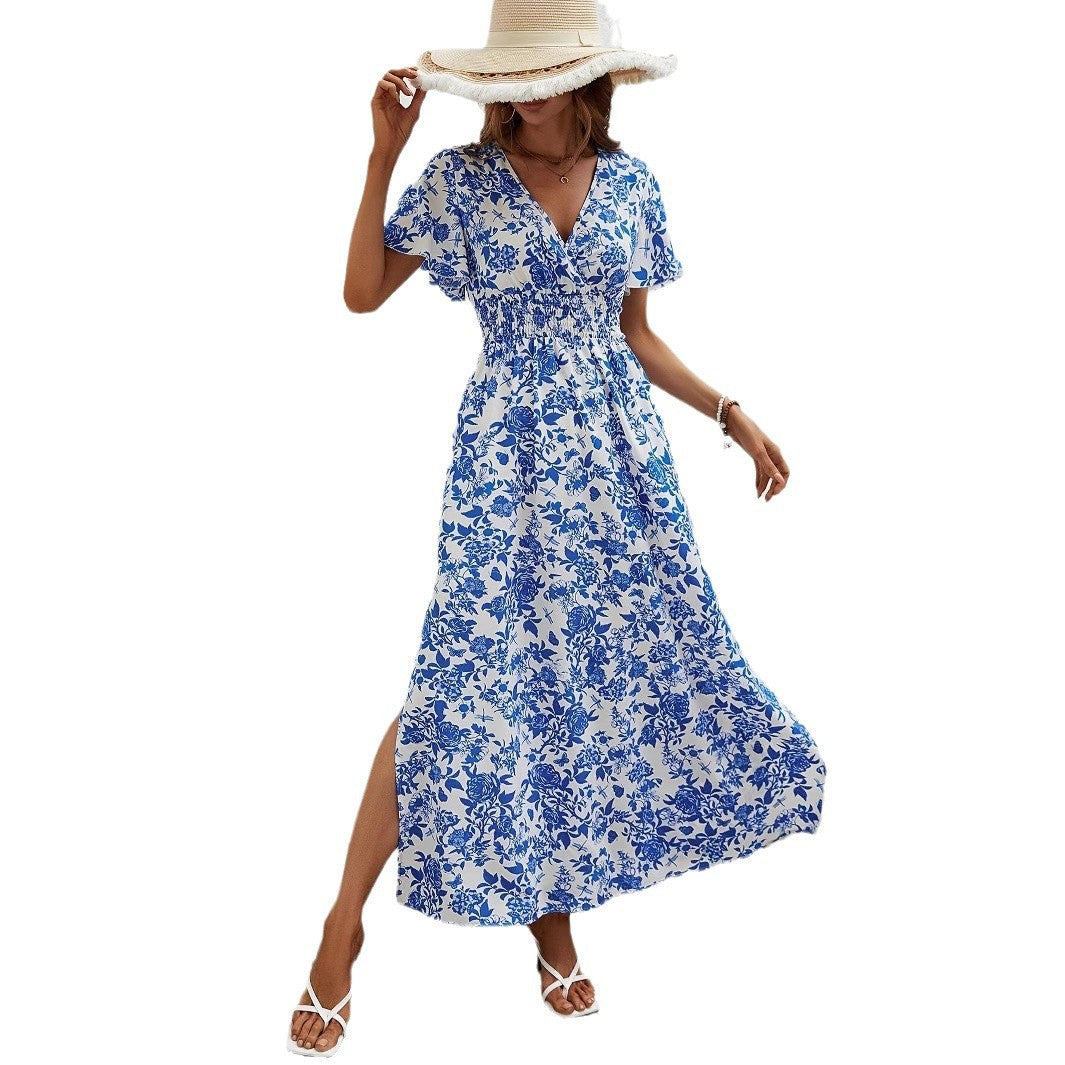 Woman wearing a blue floral dress on a white background