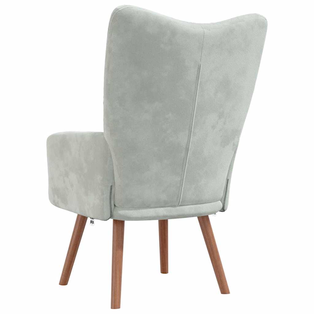 Gray upholstered chair with wooden legs on a white background