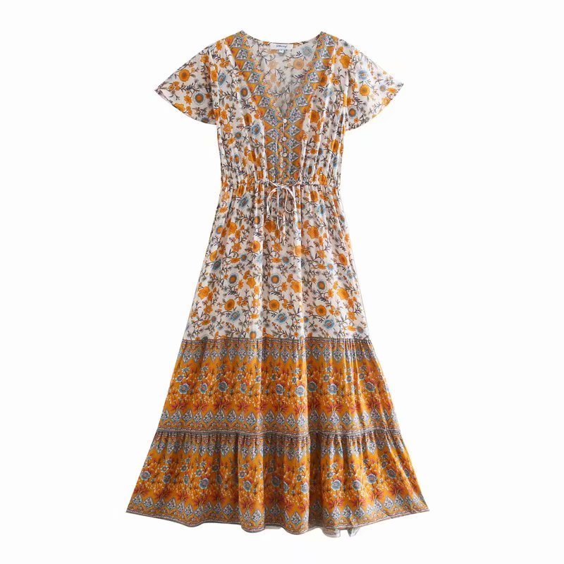 Floral patterned dress with orange and white colors on a white background