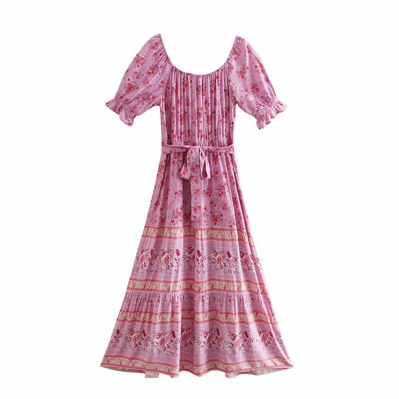 Pink floral dress with a belt on a white background