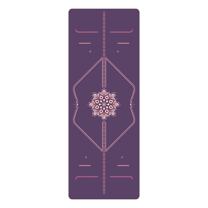 Purple yoga mat with a central floral design on a white background